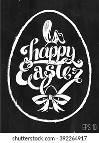 calligraphic inscription greetings - Happy Easter. sketches egg and bunny ears. bow and ribbons. lettering typography. white chalk on a blackboard. vector