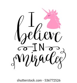 Calligraphic inscription phrase "I believe in miracles" and cute pink unicorn on white background. Vector lettering. Print for t-shirt, bag, sticker, poster, card design and textile