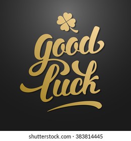 Calligraphic Inscription with Wishes a Good Luck for St. Patrick Day and other Life Events. Clover with Four Leaves - Talisman for Success, Wealth. Hand Drawn Lettering. Vector Illustration.