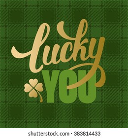 Calligraphic Inscription with Wishes a Lucky Day for You on Saint Patricks Day on Tartan Background. Shamrock - Talisman for Success, Wealth. Hand Drawn Lettering. Vector Illustration.