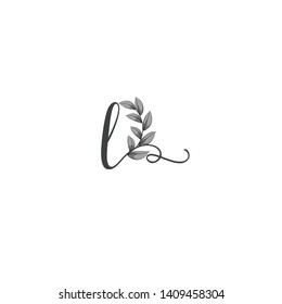 Calligraphic letter L with leaf.Hand drawn lowercase letter with natural element.Vector icon.Initial logo isolated on light background. 