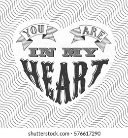 Calligraphic Logo Lettering You Are In My Heart with Vintage Ribbons in Heart Shaped Blank Space Over Diagonal Wavy Lines - Black Grunge Elements on White Paper Background - Vector Retro Style Graphic