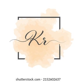 Las letras caligráficas bajas K y A se escriben en una línea sólida sobre un fondo de color en un marco.