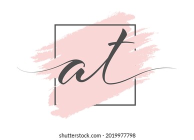 Calligraphic lowercase letters AT on a colored background in a frame. Simple Style