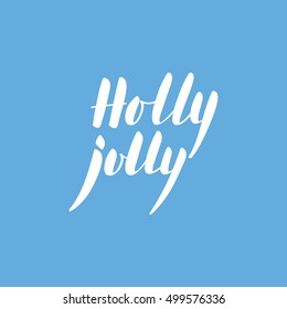 Calligraphic phrase Holly Jolly on blue background.