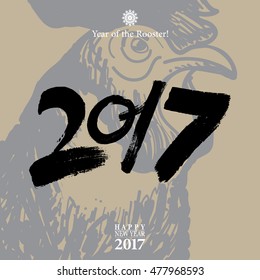 Calligraphy 2017 Happy New Year sign card with Rooster.
Vector illustration.