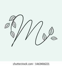 Calligraphy alphabet. Decorative handwritten font. Vector letter M decorated with leaves, florals. Wedding calligraphy. ABC for your design. Floral lettering. Monogram, Logo Branding