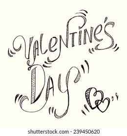 Calligraphy chalk on a white background: Valentine's Day.