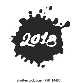 Calligraphy hand written New Year 2018 inside the black inky blot. Based on ink and brush artwork. Isolated on white background. Clipping paths included.