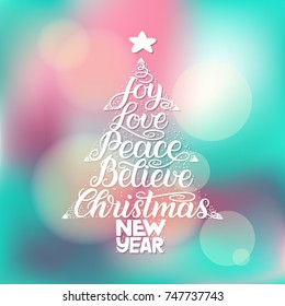 Calligraphy lettering in Christmas tree form with star. New Year, Christmas, Joy, Love, Peace, Believe
