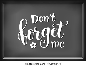 Calligraphy lettering of Dont forget me in white on chalkboard background with forget me not flowers for decoration, poster, banner, greeting card, letter, gift tag, present