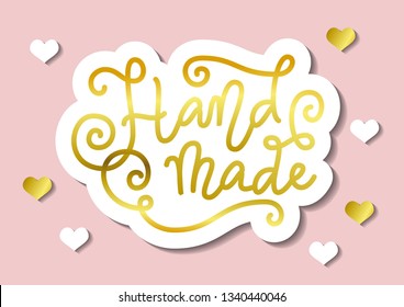 Calligraphy lettering of Hand made in golden with white outline in paper cut style with swirls on pink background with hearts for decoration, art, logo, banner, poster, packaging, advertising, sale