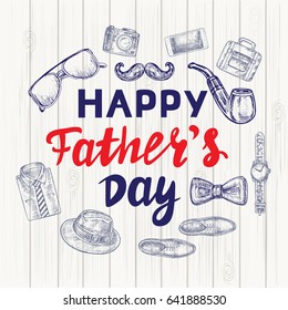 calligraphy lettering happy father`s day on wooden background