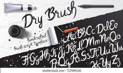 Calligraphy Mockup With Dry Brush Typeface, Pen And Paint Tube On The Background Of Black Sheet Of Paper And Grunge Table