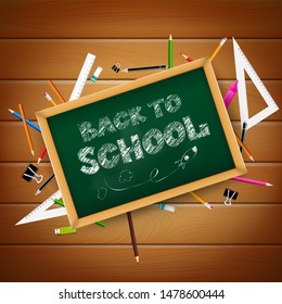 Calligraphy title text back to school over green wooden board with stationaty pen pencil eraser ruler on the white background vector illustration eps10