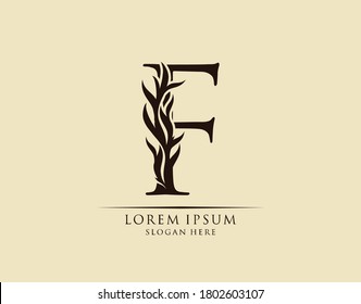 Callygraphy F Letter. Graceful royal style. Calligraphic arts logo. Vintage drawn emblem for book design, brand name, stamp, Restaurant, Boutique, Hotel.  