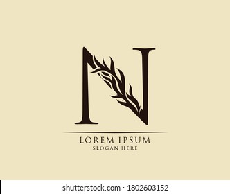 Callygraphy N Letter. Graceful royal style. Calligraphic arts logo. Vintage drawn emblem for book design, brand name, stamp, Restaurant, Boutique, Hotel.  