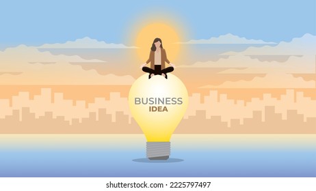 A calm businesswoman sits and meditates on a large light bulb. Think of a business idea solution to solve a problem, economic, finance, and recession. In an early morning sunrise city background.