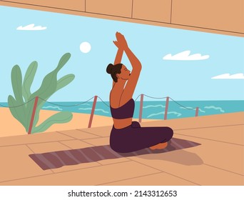 Calm woman with closed eyes and meditating in yoga lotus position. mental health. A woman practices yoga and meditates on the seashore.