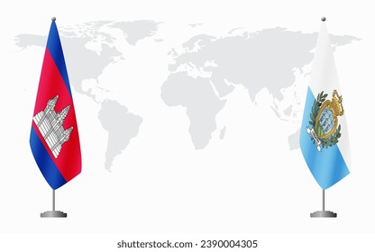 Cambodia and San Marino flags for official meeting against background of world map.