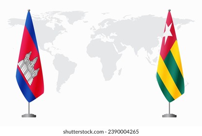 Cambodia and Togo flags for official meeting against background of world map.