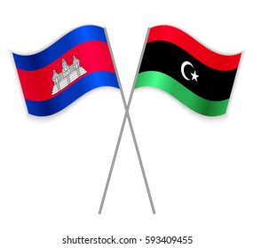 Cambodian and Libyan crossed flags. Cambodia combined with Libya isolated on white. Language learning, international business or travel concept.