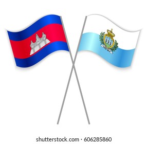 Cambodian and Sammarinese crossed flags. Cambodia combined with San Marino isolated on white. Language learning, international business or travel concept.