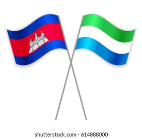 Cambodian and Sierra Leonean crossed flags. Cambodia combined with Sierra Leone isolated on white. Language learning, international business or travel concept.