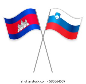 Cambodian and Slovenian crossed flags. Cambodia combined with Slovenia isolated on white. Language learning, international business or travel concept.