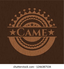 Came badge with wooden background