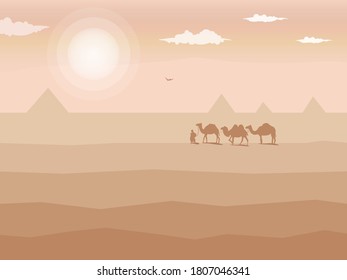 Camel caravan goes through the desert