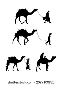 Camels and desert man silhouette walking