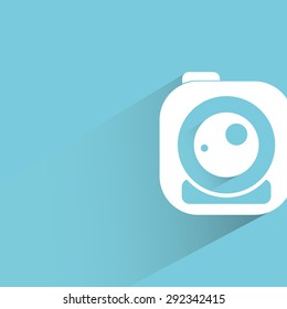 camera in blue background, shadow and flat theme