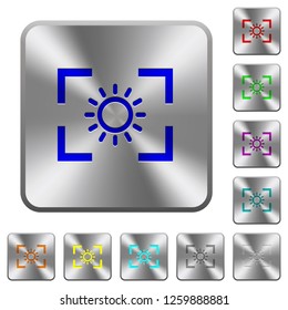 Camera brightness setting engraved icons on rounded square glossy steel buttons