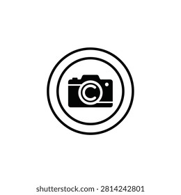 Camera with a copyright symbol inside the lens on a white background