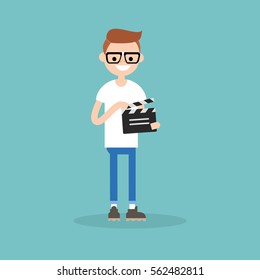 Camera crew: young assistant holding a clapperboard / editable flat vector cartoon illustration, clip art