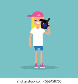 Camera crew: young operator holding a camera / editable flat vector cartoon illustration, clip art