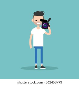 Camera crew: young operator holding a camera / editable flat vector cartoon illustration, clip art