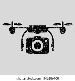 Camera Drone grainy textured icon for overlay watermark stamps. Flat symbol with dirty texture. Dotted vector black ink rubber seal stamp with grunge design on a light gray background.