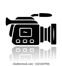 Camera drop shadow black glyph icon. Camcorder. Videotaping, video recording. Filmmaking professional equipment. Video production, cinematography industry. Isolated vector illustration