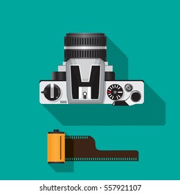 Camera film top view and film with shadow and green flat background vector illustration 