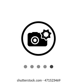 Camera with flash in circle