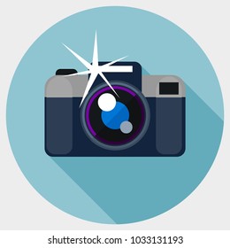 A camera with a flash, a flat icon with a shadow.