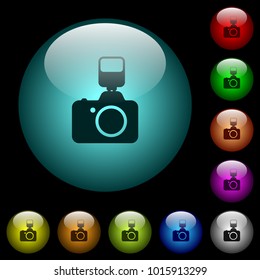 Camera with flash icons in color illuminated spherical glass buttons on black background. Can be used to black or dark templates