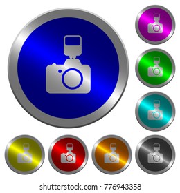 Camera with flash icons on round luminous coin-like color steel buttons