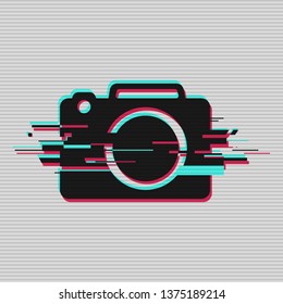 Camera flat icon. Random digital error signal. Glitch with the image of the camera. Clothing design element. Vector