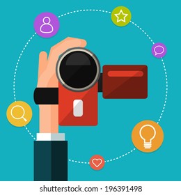 Camera in hand. Flat style