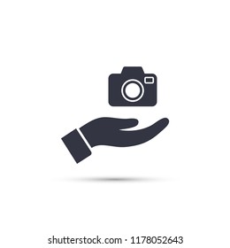 Camera in hand icon