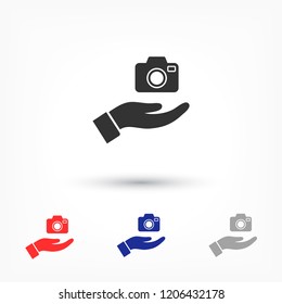 Camera in hand icon