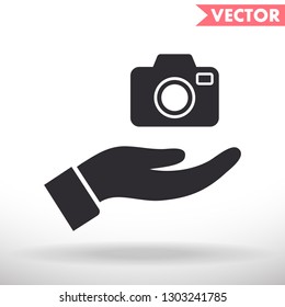 Camera in hand icon